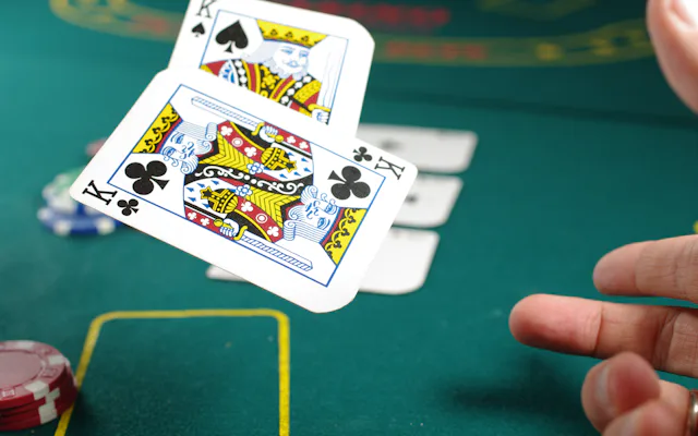 Player showing a pair of kings in a poker game