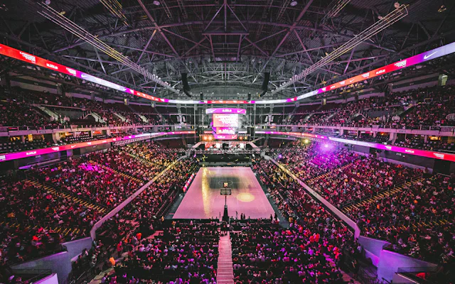 Packed basketball arena, the kind of game Filipino fans bet on at MegaPerya